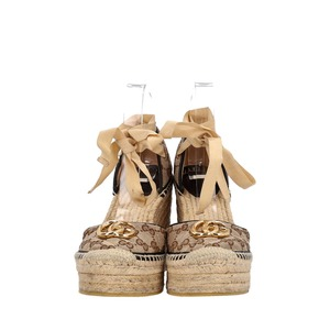 https://dbiyorq10n2b9.cloudfront.net/product-images/CSHOGUC0822/GUCCI-Canvas-GG-Wedge-Espadrilles-Beige_3-1.jpg.webp