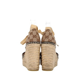https://dbiyorq10n2b9.cloudfront.net/product-images/CSHOGUC0822/GUCCI-Canvas-GG-Wedge-Espadrilles-Beige_4-1.jpg.webp