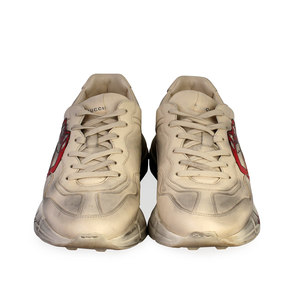 https://dbiyorq10n2b9.cloudfront.net/product-images/CSHOGUC231/GUCCI-Leather-Mouth-Print-Rhyton-Sneakers-White-S-44-9.5-front.jpg.webp
