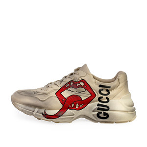 https://dbiyorq10n2b9.cloudfront.net/product-images/CSHOGUC231/GUCCI-Leather-Mouth-Print-Rhyton-Sneakers-White-S-44-9.5-side.jpg.webp