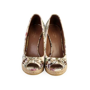 https://dbiyorq10n2b9.cloudfront.net/product-images/CSHOGUC254/GUCCI-Canvas-Horsebit-Wedges-Floral-S-36.5-3.5-front.jpg.webp