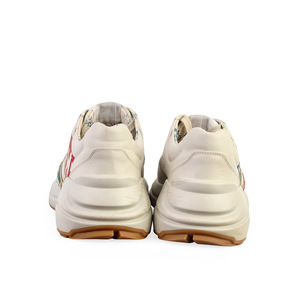 https://dbiyorq10n2b9.cloudfront.net/product-images/CSHOGUC258/GUCCI-Leather-Glitter-Rhyton-Sneakers-White-S-40-6.5-back.jpg.webp