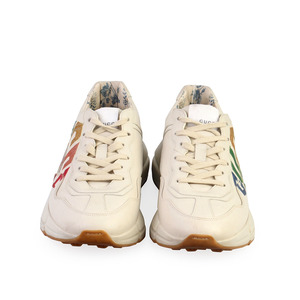 https://dbiyorq10n2b9.cloudfront.net/product-images/CSHOGUC258/GUCCI-Leather-Glitter-Rhyton-Sneakers-White-S-40-6.5-front.jpg.webp