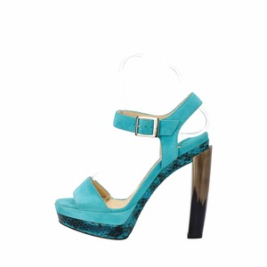 https://dbiyorq10n2b9.cloudfront.net/product-images/CSHOJC0334/JIMMY-CHOO-Suede-Python-Dora-Platform-Sandals-Turquoise_4.jpg.webp