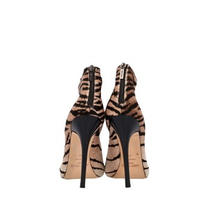 https://dbiyorq10n2b9.cloudfront.net/product-images/CSHOJC0367/JIMMY-CHOO-Pony-Hair-Lace-up-Sandals-Zebra-Print_3.jpg.webp