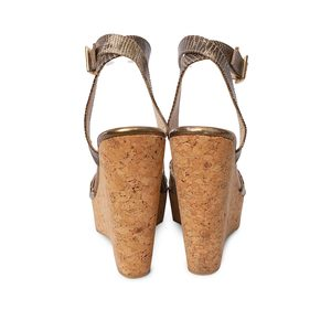 https://dbiyorq10n2b9.cloudfront.net/product-images/CSHOJC0380/JIMMY-CHOO-Snakeskin-Papyrus-Wedge-Sandals-Beige-5.jpg.webp
