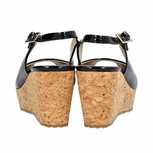 https://dbiyorq10n2b9.cloudfront.net/product-images/CSHOJC0398/JIMMY-CHOO-Patent-Cork-Wedge-Slingback-Pumps-Black_4.jpg.webp