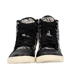https://dbiyorq10n2b9.cloudfront.net/product-images/CSHOLAN0020/LANVIN-Fabric-Leather-Jewels-High-Top-Sneakers-White-Black_3.jpg.webp