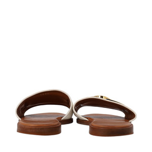 https://dbiyorq10n2b9.cloudfront.net/product-images/CSHOLV0278/LOUIS-VUITTON-Leather-Lock-It-Flat-Mules-Blanc_3.jpg.webp
