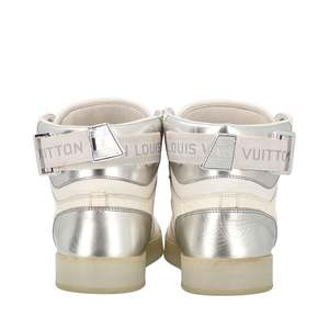 https://dbiyorq10n2b9.cloudfront.net/product-images/CSHOLV0554/LOUIS-VUITTON-Leather-Rivoli-Sneaker-Boots-White_4..jpg.webp