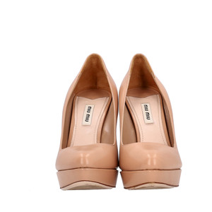 https://dbiyorq10n2b9.cloudfront.net/product-images/CSHOMIU0024/MIU-MIU-Leather-Platform-Pumps-Nude_3.jpg.webp