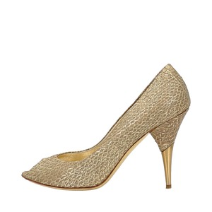 https://dbiyorq10n2b9.cloudfront.net/product-images/CSHOMIU0035/MIU-MIU-Metallic-Snakeskin-Open-Toe-Pumps-Gold_1.jpg.webp