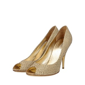 https://dbiyorq10n2b9.cloudfront.net/product-images/CSHOMIU0035/MIU-MIU-Metallic-Snakeskin-Open-Toe-Pumps-Gold_2.jpg.webp