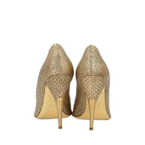 https://dbiyorq10n2b9.cloudfront.net/product-images/CSHOMIU0035/MIU-MIU-Metallic-Snakeskin-Open-Toe-Pumps-Gold_4.jpg.webp