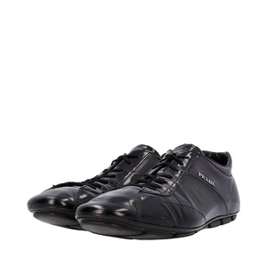 https://dbiyorq10n2b9.cloudfront.net/product-images/CSHOPRA0191/PRADA-Patent-Sneakers-Black_2.jpg.webp
