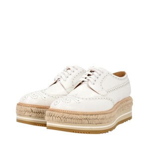 https://dbiyorq10n2b9.cloudfront.net/product-images/CSHOPRA0216/PRADA-Leather-Platform-Brogue-Espadrilles-White_1.jpg.webp