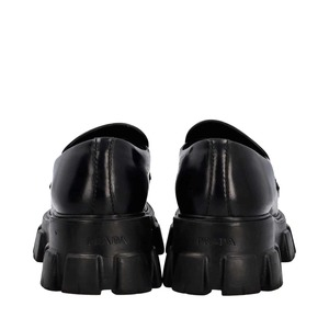 https://dbiyorq10n2b9.cloudfront.net/product-images/CSHOPRA0263/PRADA-Leather-Monolith-Loafers-Black_4.jpg.webp