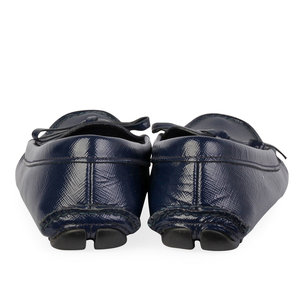 https://dbiyorq10n2b9.cloudfront.net/product-images/CSHOPRA158/PRADA-Patent-Leather-Driving-Loafers-Blue-S-36-3-back.jpg.webp