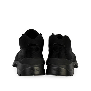 https://dbiyorq10n2b9.cloudfront.net/product-images/CSHOPRA178/PRADA-Pony-Hair-Ankle-Boots-Black-S-44-9.5-back.jpg.webp