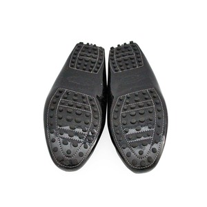https://dbiyorq10n2b9.cloudfront.net/product-images/CSHOTOD0034/TODS-Patent-Gommino-Buckle-Loafers-Black-S-38.5-5.5-soles.jpg.webp