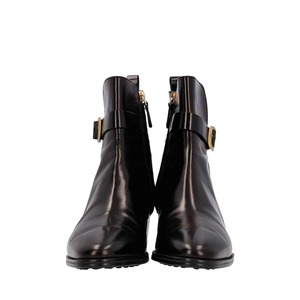 https://dbiyorq10n2b9.cloudfront.net/product-images/CSHOTOD0193/TODS-Leather-Buckle-Ankle-Boots-Black_3.jpg.webp