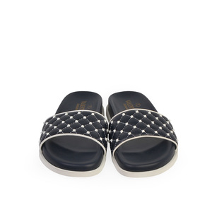 https://dbiyorq10n2b9.cloudfront.net/product-images/CSHOVA128/VALENTINO-Leather-Rockstud-Spike-Slides-NavyWhite-S-35.5-3-front.jpg.webp