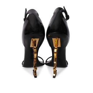 https://dbiyorq10n2b9.cloudfront.net/product-images/CSHOYSL0118/SAINT-LAURENT-Patent-Opyum-Sandals-Black-7.jpg.webp