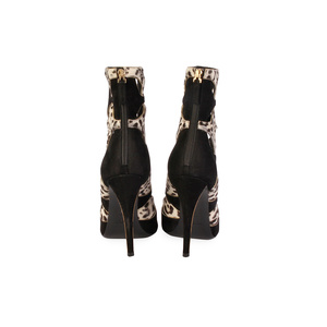 https://dbiyorq10n2b9.cloudfront.net/product-images/CSHOYSL103/YVES-SAINT-LAURENT-Leopard-Printed-Cowhide-Clara-Cut-Out-High-Heel-Bootie-White-Black-%E2%80%93-S-38-5-back.jpg.webp