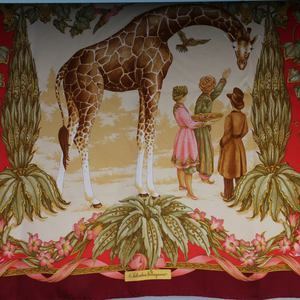 https://dbiyorq10n2b9.cloudfront.net/product-images/CSHWFER101/SALVATORE-FERRAGAMO-Giraffe-Print-Silk-Scarf-Maroon-open.jpg.webp