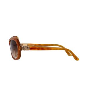 https://dbiyorq10n2b9.cloudfront.net/product-images/CSUNESC0004/ESCADA-Sunglasses-SES-167-Brown_3.jpg.webp