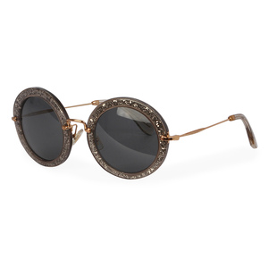 https://dbiyorq10n2b9.cloudfront.net/product-images/CSUNMIU111/MIU-MIU-Round-Sunglasses-SMU-13N-Glitter-angle.jpg.webp