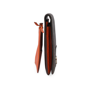 https://dbiyorq10n2b9.cloudfront.net/product-images/CWALHER0001/HERMES-Leather-Dogon-Duo-Wallet-OrangeBlack-side.jpg.webp
