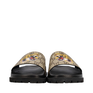 https://dbiyorq10n2b9.cloudfront.net/product-images/SHOGUC0441/GUCCI-GG-Supreme-Tiger-Slides-Beige_1.jpg.webp