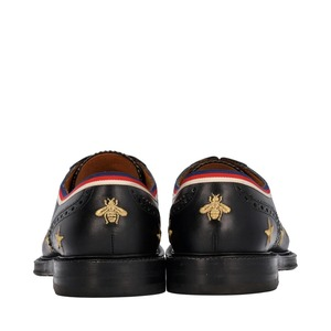 https://dbiyorq10n2b9.cloudfront.net/product-images/SHOGUC0617/GUCCI-Leather-Star-Bee-Loafers-Black_5.jpg.webp