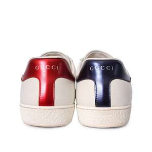 https://dbiyorq10n2b9.cloudfront.net/product-images/SHOGUC0708/GUCCI-Leather-Angry-Cat-Sneakers-White-4.jpg.webp