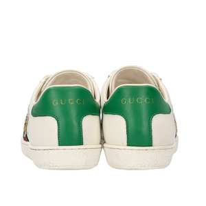 https://dbiyorq10n2b9.cloudfront.net/product-images/SHOGUC0716/GUCCI-X-DISNEY-Leather-Donald-Duck-Sneakers-White_4.jpg.webp