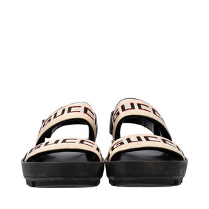 https://dbiyorq10n2b9.cloudfront.net/product-images/SHOGUC0769/GUCCI-Gucci-Stripe-Strap-Sandals-Black-White_2.jpg.webp