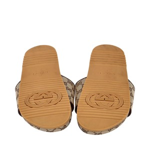 https://dbiyorq10n2b9.cloudfront.net/product-images/SHOGUC0932/GUCCI-Canvas-GG-Platform-Slides-Beige_1.jpg.webp