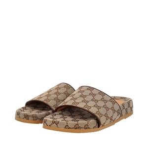 https://dbiyorq10n2b9.cloudfront.net/product-images/SHOGUC0932/GUCCI-Canvas-GG-Platform-Slides-Beige_3.jpg.webp