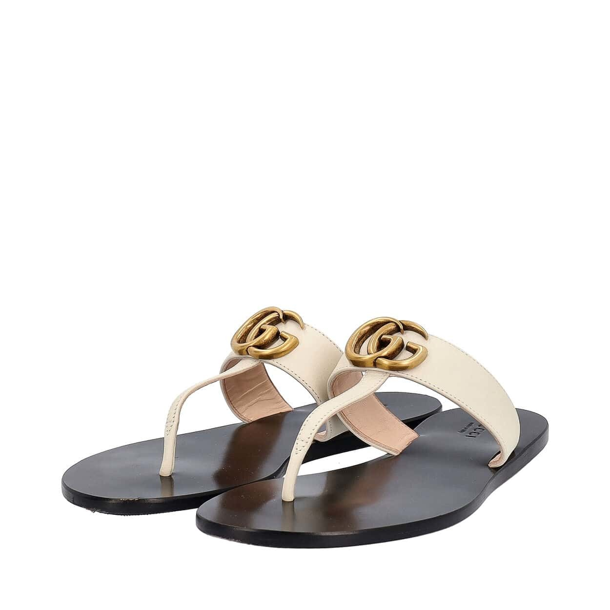 https://dbiyorq10n2b9.cloudfront.net/product-images/SHOGUC0982/GUCCI-Leather-Thong-Double-G-Sandals-White_4.jpg.webp