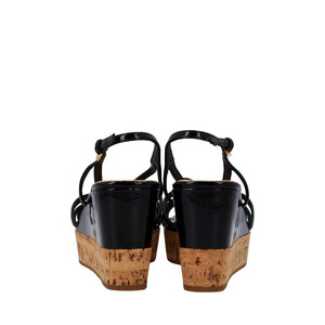 https://dbiyorq10n2b9.cloudfront.net/product-images/SHOPRA0114/PRADA-Patent-Leather-Cork-Wedge-Sandals-Black_3.jpg.webp