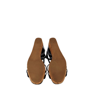 https://dbiyorq10n2b9.cloudfront.net/product-images/SHOPRA0114/PRADA-Patent-Leather-Cork-Wedge-Sandals-Black_5.jpg.webp