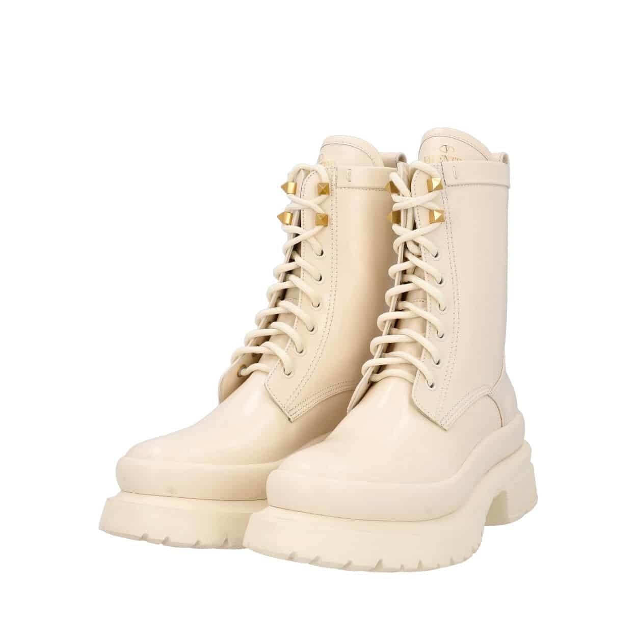 https://dbiyorq10n2b9.cloudfront.net/product-images/SHOVAL0076/VALENTINO-Leather-Combat-Boots-Off-White_3.jpg.webp